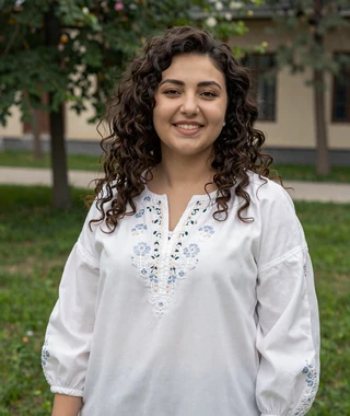 Shahnoza, 27 year old Tajik woman member from Dushanbe with warm smile